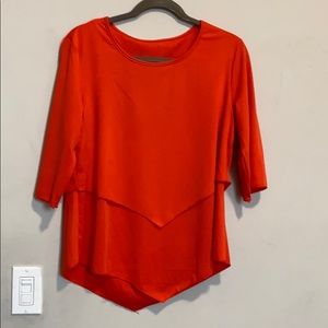 Layered orange scoop neck top